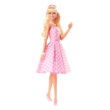 Boneca Barbie vestido de...